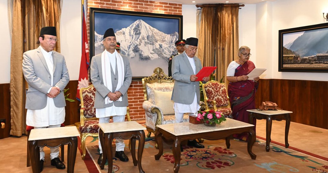 President Ram Chandra Paudel (2nd from R) administering oath of office and secrecy to newly-appointed Prime Minister Sushila Karki (R) on Friday.